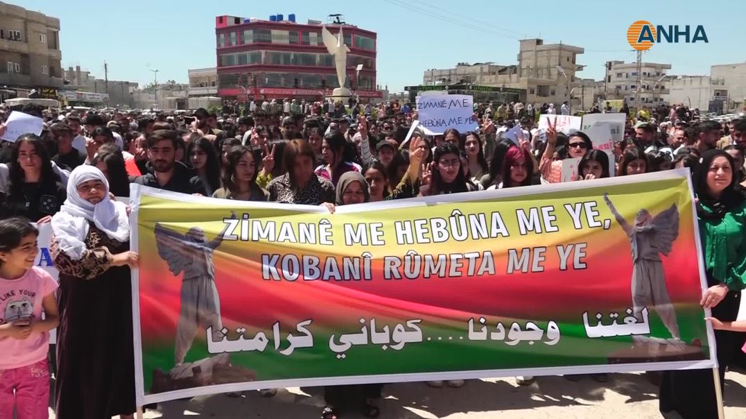Şêniyên Kobanê bi meşekê hewldanên guhertina navan şermezar kir